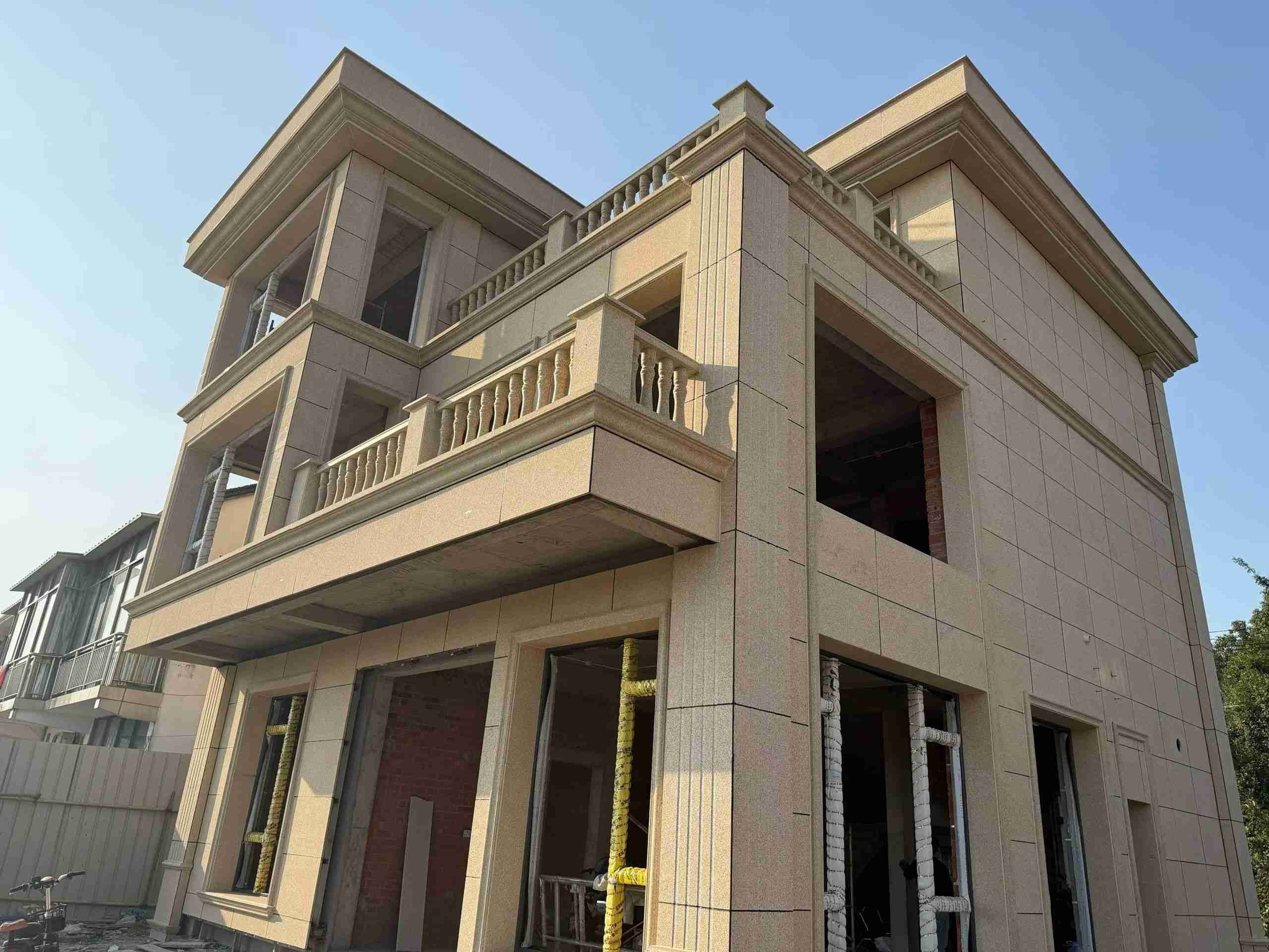 海口 黄金麻花岗岩石材荔枝面外墙干挂效果展示